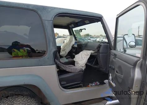 2000 Jeep Wrangler Sport z USA, uszkodzony, nr VIN 1J4FA49S7YP742444